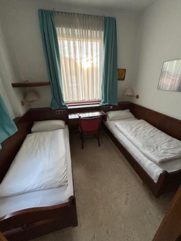 Zweibettzimmer mit eigenem Bad